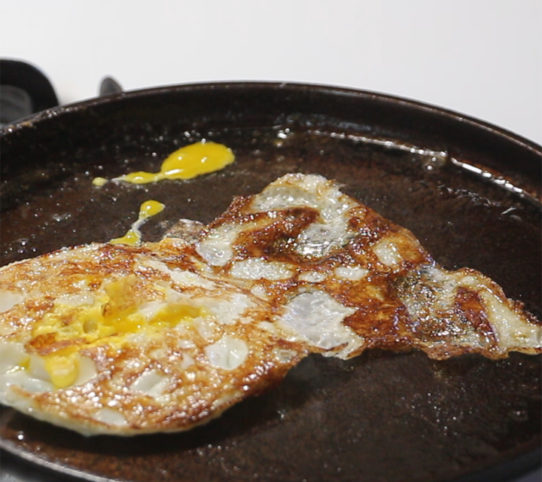 how to stop food from sticking to cast iron pans