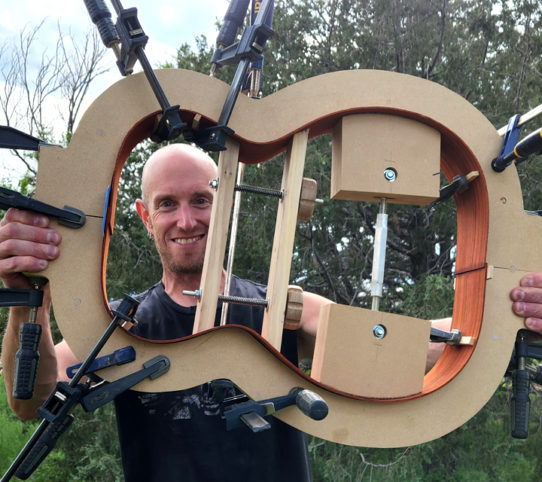 Bending the sides for a handmade acoustic guitar