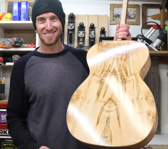 spraying the waterbased finish on my handmade acoustic guitar