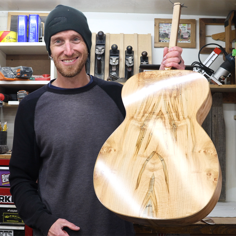 spraying the waterbased finish on my handmade acoustic guitar